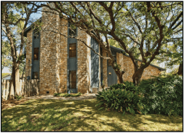 The amazing cluster of live oaks out front. Well, about half of it anyway. It's that big. 